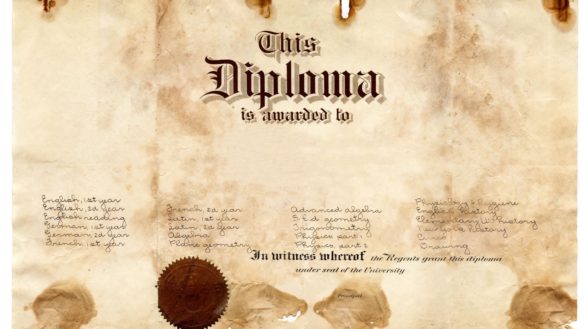 copy of old college diploma featuring shiny gold seals